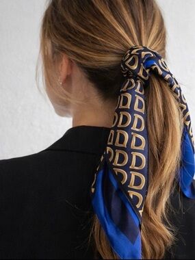 Elevated designer inspired monogram scarf in a rich navy, gold, and bold blue